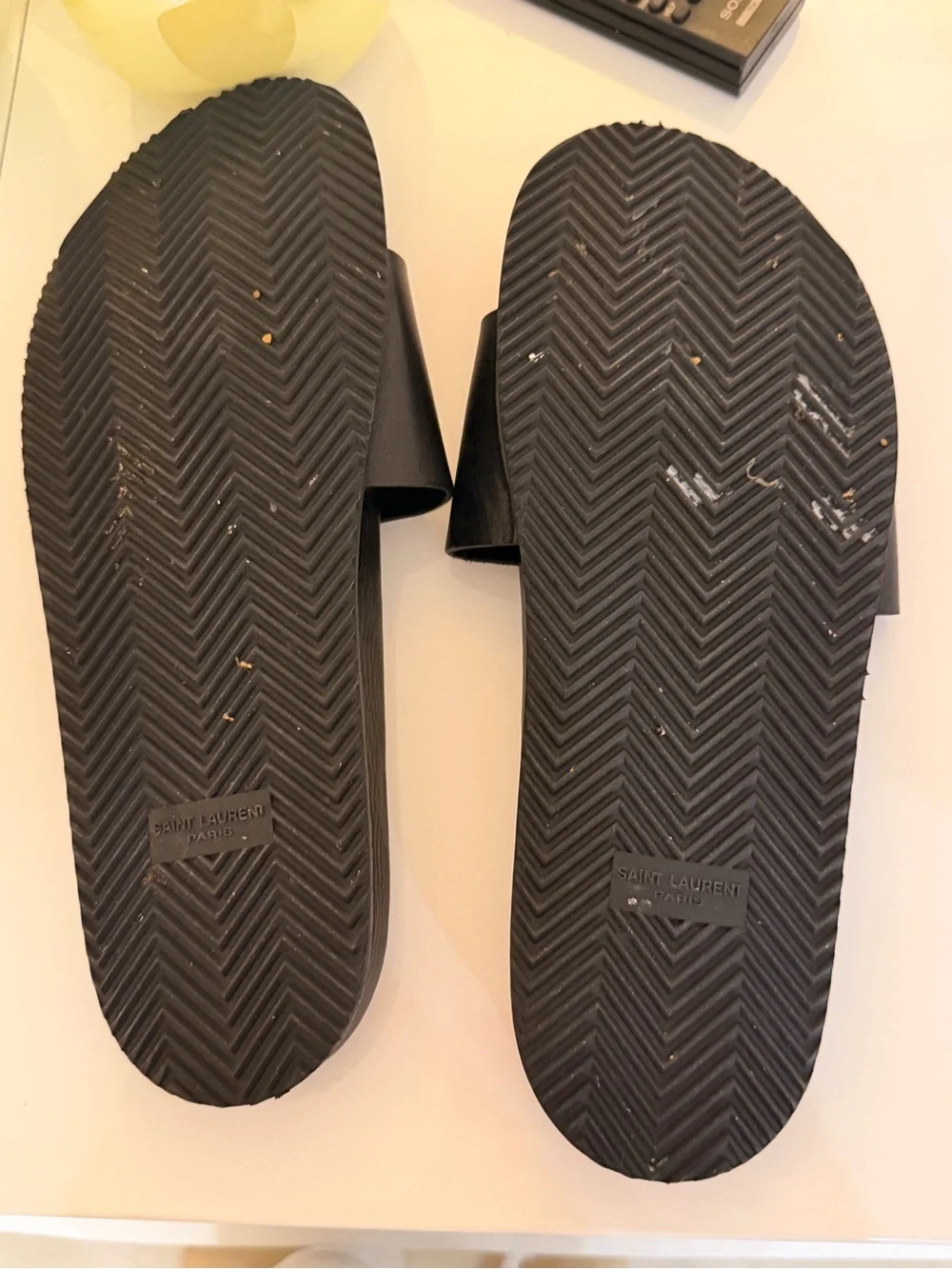 Saint Laurent Black Leather YSL Embossed Slide Sandals